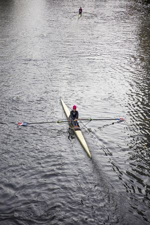 HANOVER, GERMANY - OCTOBER 27, 2018: Unidentified woman rowing in Hanover, Germany. Thanks to the...