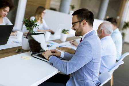 View at business people discussing a strategy and working together in officeの写真素材