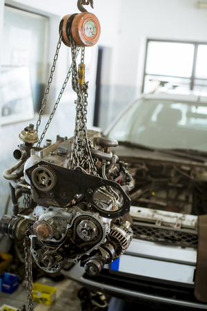 Close up view at car engine in the serviceの写真素材