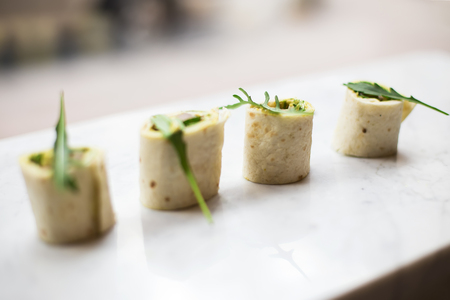 Delicious chicken rolls appertizers on the tableの写真素材