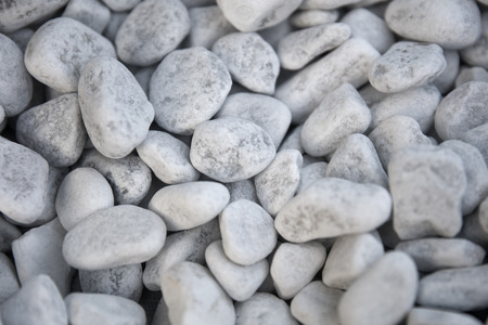 Closeup detail of the white pebbles backdropの写真素材