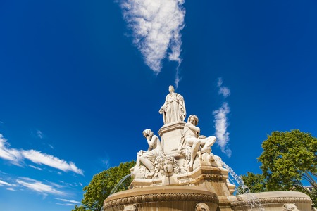 Detail of Pradier fountain at Esplanade Charles-de-Gaulle in Nimes, Franceの写真素材