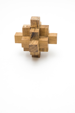 Wooden blocks puzzle toy isolated on the white backgroundの写真素材