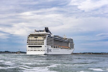 VENICE, ITALY - MAY 26, 2019: View at MSC Magnifica cruise ship in Venice, Italy. This 13 decks ship was launched at 2009 and have capacity of 3605 passengers.のeditorial素材