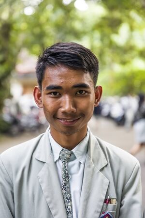 UBUD, INDONESIA - JANUARY 28, 2019: Unindentified high school student on the street of Ubud on Bali island, Indonesia. Indonesiaâs education system is the fourth-largest in the world.のeditorial素材
