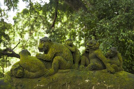 Monkey statue at Ubud Monkey Forest sanctuary at Bali island, Indonesia