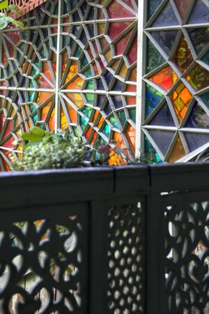 TBILISI, GEORGIA - MAY 3, 2019: Detail of the stained glass window in Tbilisi, Georgia. This house...