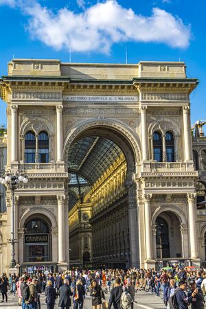 MILAN, ITALY - APRIL 15, 2019: Unidentified people by Galleria Vittorio Emanuele II in Milan, Italy. It is one of the world's oldest shopping malls, built by Giuseppe Mengoni between 1865 and 1877.のeditorial素材