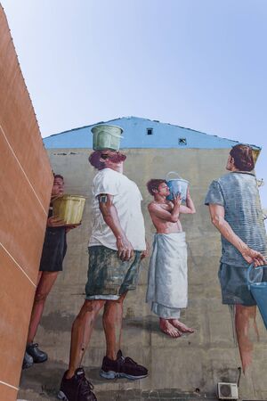 ISTANBUL, TURKEY - JUNE 17, 2019: Pray for Rain mural in Istanbul, Turkey. Mural was made by Australian street artist Fintan Magee for Mural Istanbul Festival 2017.のeditorial素材
