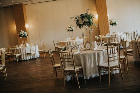 Detail of wedding banquet tables with flowers decoration