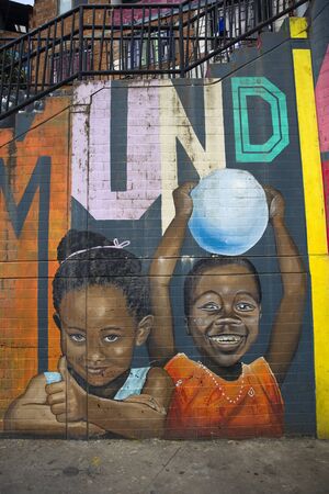 MEDELLIN, COLOMBIA - SEPTEMBER 12, 2019: Street art of Comuna 13 in Medellin, Colombia. Once known as Colombias most dangerous barrio, today graffiti tour is one of the most popular tourist attractions in Medellin.のeditorial素材