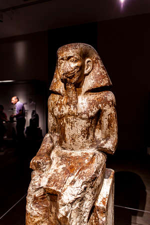 TURIN, ITALY - JUNE 3, 2015: Statue of the governor Wakha, son of Neferhotep in Museo Egizio in Turin, Italy. Museum houses one of the largest collections of Egyptian antiquities with more than 30,000 artefacts.のeditorial素材