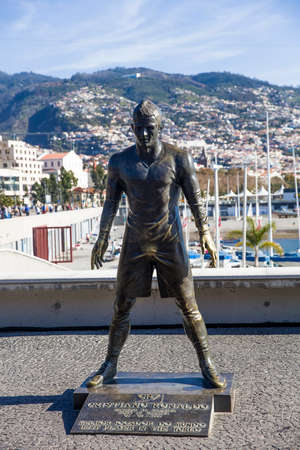 FEBRUARY 9, 2020: Christiano Ronaldo Statue in Funchal at Madeira Island, Portugal. Statue of famous Madeiran football player was created by sculptor Ricardo Velosa in 2014.のeditorial素材