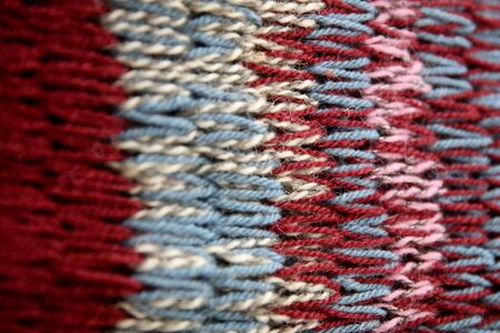 Closeup detail of the handmade colorful knitting texture