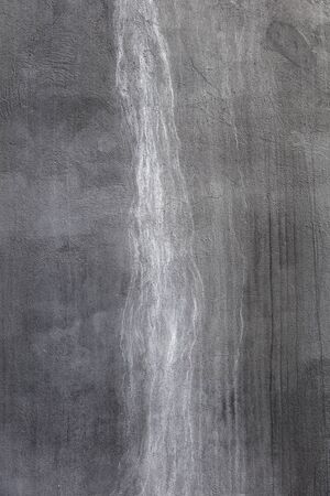 Closeup of the abstract empty background of blank grey concrete wall textureの写真素材