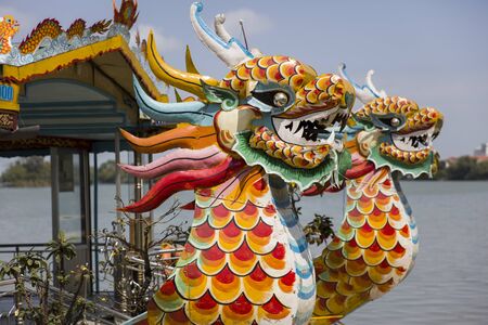 Closeup of the traditional dragon boat on the Perfume river in Hue, Vietnamの写真素材