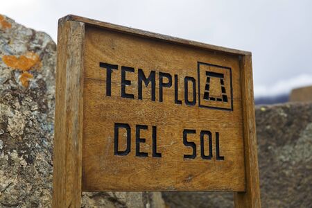 View at sign for Templo del Sol at Ollantaytambo Inca archaeological site in Peruの写真素材