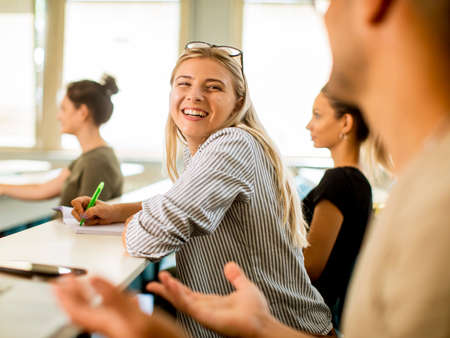 Group of university students in the classroomの写真素材