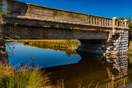 View at old stone bridge on Crni Rzav river at Zlatibor mountain, Serbiaの写真素材