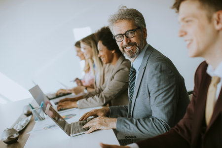 Group of multiethnic business people working together in the officeの写真素材