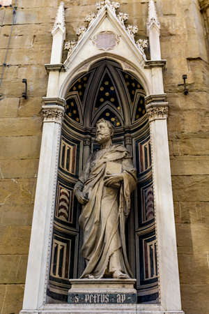 View at marble statue of Saint Peter by Donatello, at Orsanmichele church exterior in Florence,...