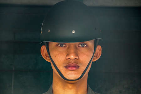 BANGKOK, THAILAND - JANUARY 11, 2012: Unidentified Royal Thai Army soldier standing guard at Grand Palace in Bangkok, Thailand. They provide ceremonial and practical security to Grand Palace compound in Bangkok.のeditorial素材
