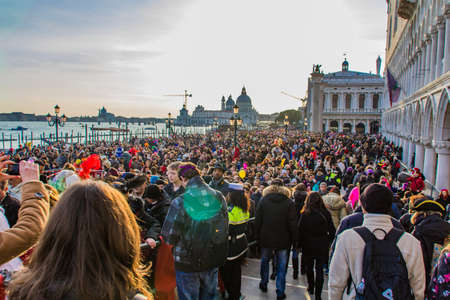 VENICE, ITALY - FEBRUARY 9, 2013: Unidentified people at Venetian Carnival in Venice, Italy. At 2013 it is held from January 26th to February 12th.のeditorial素材