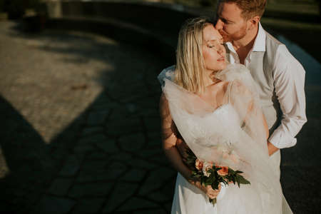 Closeup of the cute young newlywed coupleの写真素材