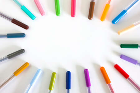 Colorful markers with oval empty copyspace