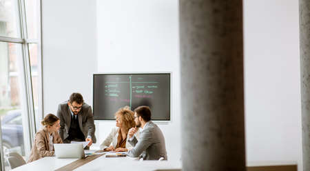 Group of multiethnic young business people working together in the office