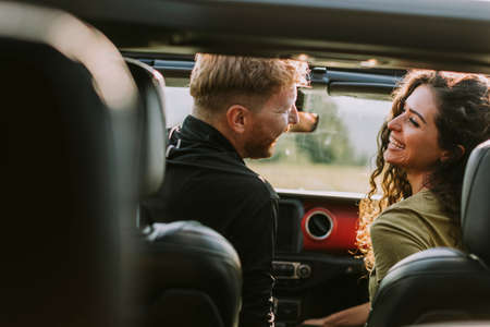 Young handsome couple having fun on roadtripの写真素材