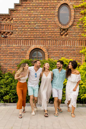 Group of young people having fun outdoors