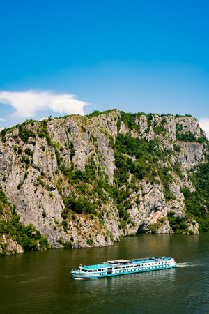 Danube, Serbia - July 1, 2022: Der kleine Prinz (The Little Prince) river cruise ship in Danube Gorge in Serbia. Ship was built in 1990s, accomodate 90 passengers and sailing under the flag of Germany.のeditorial素材