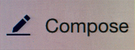 Closeup of the compose email sign on the screenの写真素材