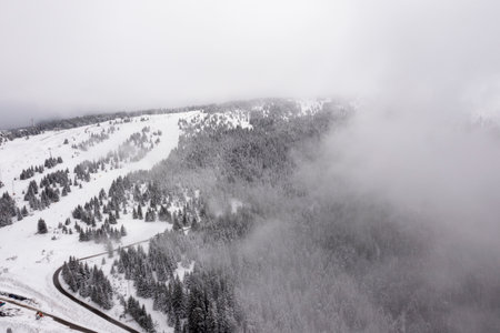 Drone view at mountain in snowy winterの写真素材