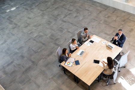 Aerial view at young startup team working in the modern officeの写真素材