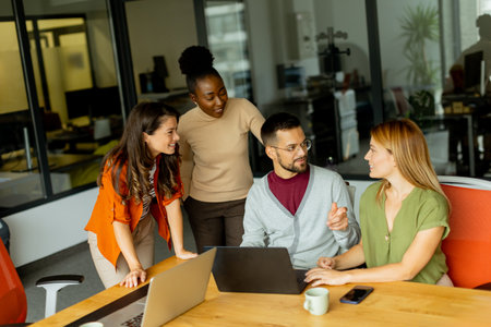 Young multiethnic startup team working at the modern officeの写真素材