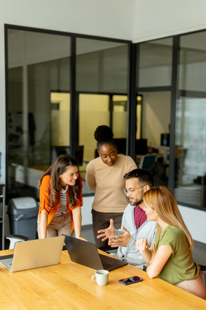 Young multiethnic startup team working at the modern officeの写真素材