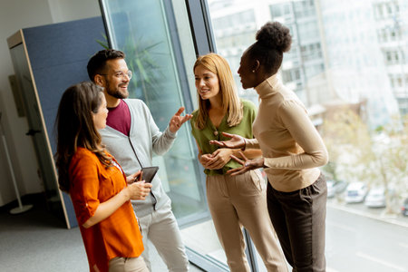 Young multiethnic startup team working at the modern office