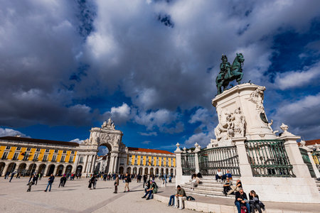 Lisbon, Portugal - February 16, 2025: Unidentified people by equestrian Statue of King Jose I in...