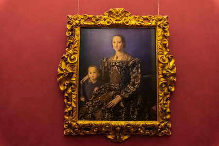 Florence, Italy - April 7, 2018: Portrait of Eleanor of Toledo with her son Giovanni de' Medici by Agnolo Bronzino from Galleria degli Uffizi, Florence. It is an gallery in Florence founded in 1581.のeditorial素材