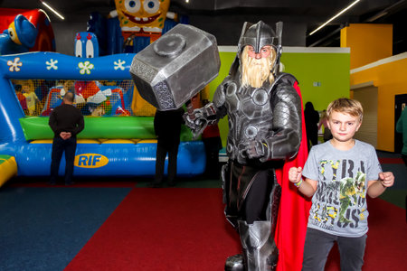 a boy in the children's center is playing - they are going through a quest with a viking animatorの写真素材