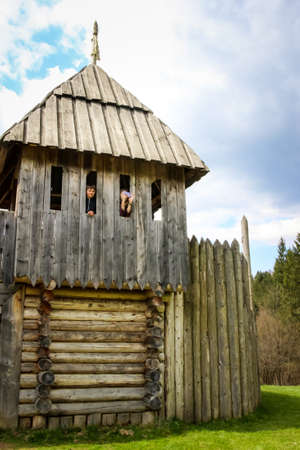young girl and boy tourists in the forest, Tustan Fortress, Carpathians, Western Ukraineの写真素材