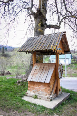 old wooden well at the historical and cultural museum "Tustan", Carpathians, Western Ukraineの写真素材