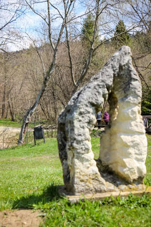 a young man with a girl on a stone rock fortress in the historical and cultural reserve, "Tustan", Carpathians, Western Ukraineの写真素材