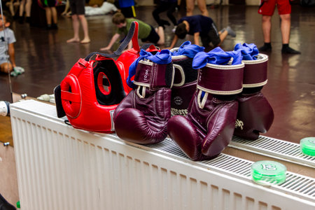 Red boxing gloves for sale in Bangkok, Thailand.の写真素材