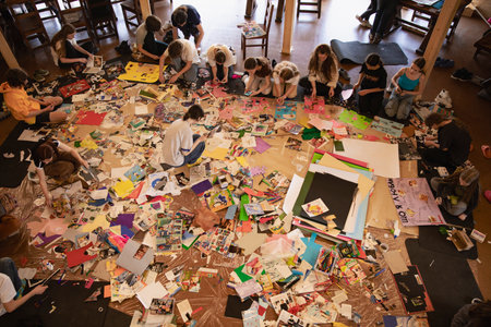 High angle view of a group of diverse students studying in a classroomの写真素材