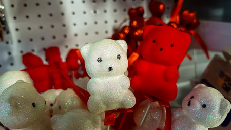 souvenir bears on foam sticks, white with sparkles, red, velvet coating, decorative elements, blanks, for holidayの写真素材