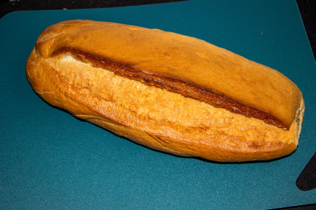 loaf of bread on blue cutting board, cutting board, loaf, wheat flour, crispy crust, baked, toasted...