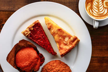 cup of cappuccino with dessertの写真素材